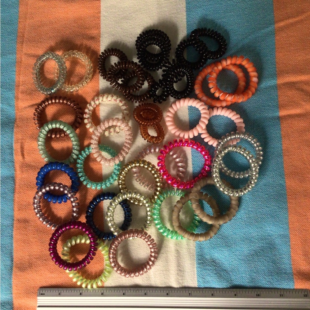 Variety of hair ties. 37 total.